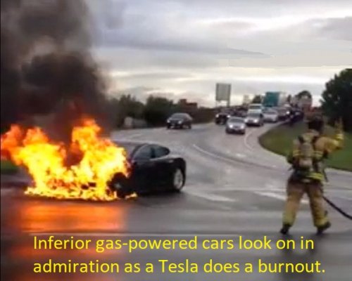 0000000 Inferior gas-powered cars look on in admiration at how well the Tesla is handling this...jpg