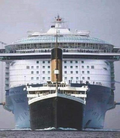 The titanic in comparison to a modern cruise ship.jpg