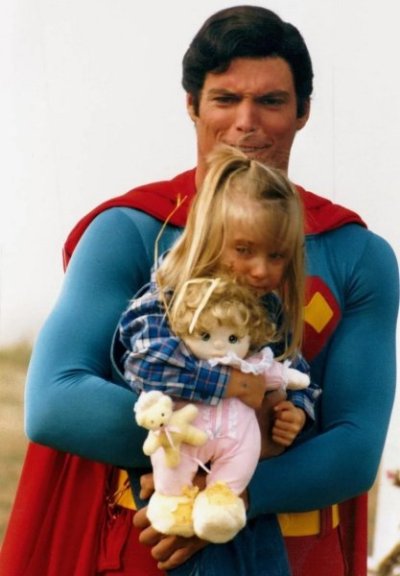 christopher-reeves-with-his-daughter behind the scenes Superman movie.jpg