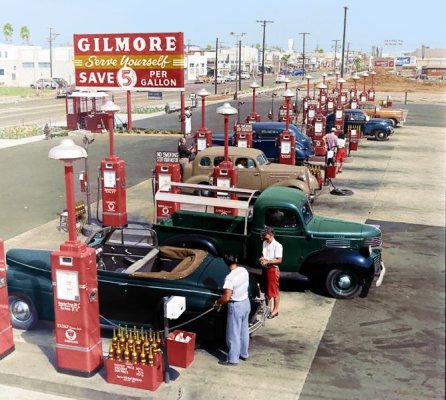 Fillin' up at Gilmore's Gas-A-Teria in Los Angeles - 1948. One of the first self-serve gas sta...jpg