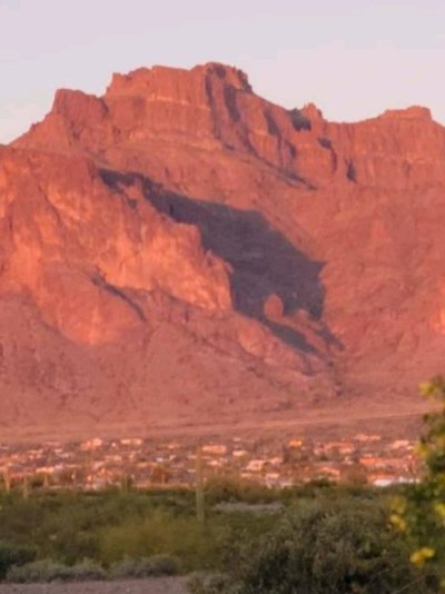 Cougar shadow on the Superstition Mountains, Apache Junction, AZ.jpg