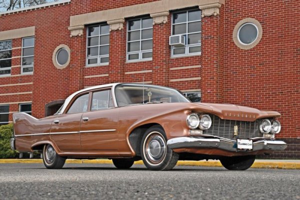 color-image-of-a-1960-plymouth-savoy-parked-in-front-of-a-building-in-a-front-3-4-position.jpg