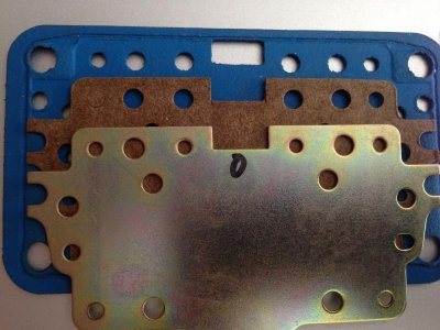Metering plate defective gasket.jpg Metering plate defective gasket.jpg