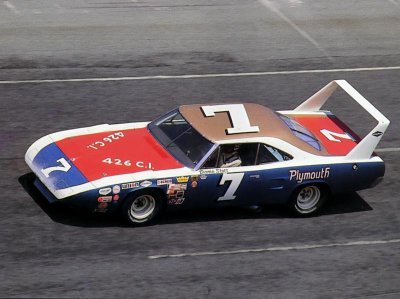 1970-plymouth-road-runner-superbird-nascar-race-car-at-speed-driven-by-ramo-stott-red_-white_-_a.jpg