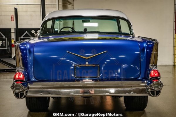 dealer-selling-customized-1957-chevy-bel-air-with-new-muscle-car-sized-price-tag_8.jpg