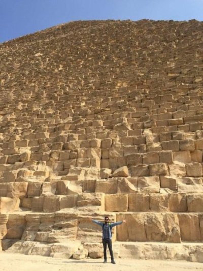 Tiny-man-in-front-of-huge-pyramid-15848.jpeg