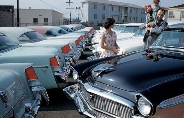 '56 Chrysler New Yorkers on display at a dealership.jpg