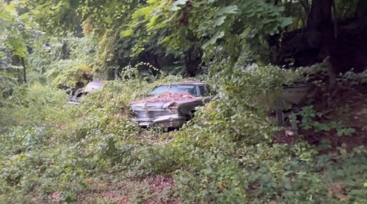 creepy-abandoned-house-has-big-finned-mopars-buried-in-the-yard_9.jpg