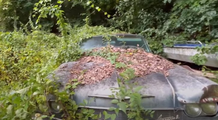 creepy-abandoned-house-has-big-finned-mopars-buried-in-the-yard_5.jpg