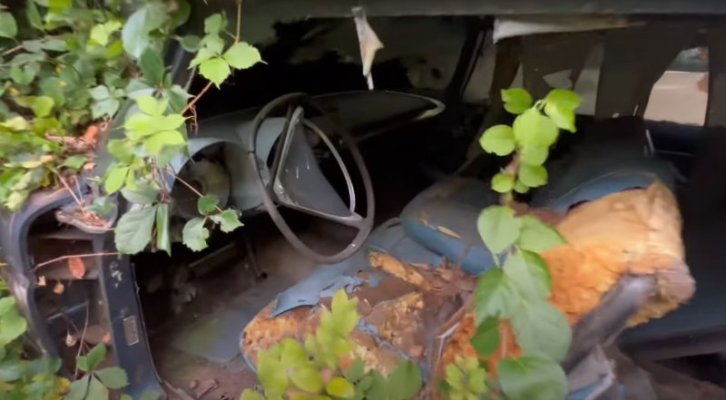 creepy-abandoned-house-has-big-finned-mopars-buried-in-the-yard_2.jpg