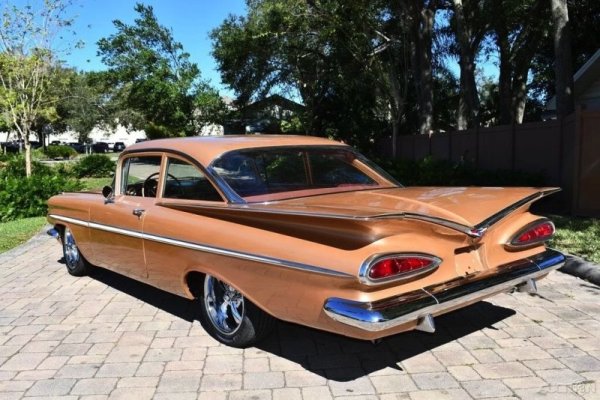world-meet-a-flawless-1959-chevy-bel-air-with-a-corvette-surprise-under-the-hood-243760_1.jpg
