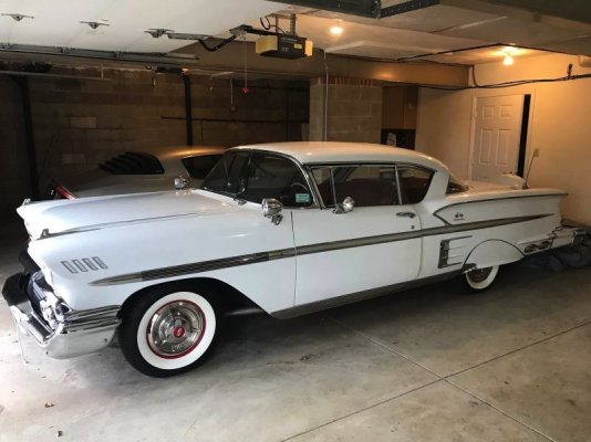 dealer-sells-babied-1958-chevy-impala-348-tri-power-the-odometer-shows-3975-miles-245904_1.jpg