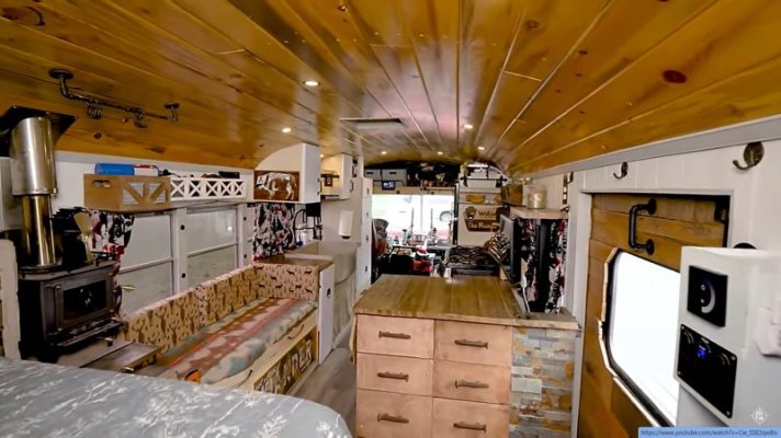 the-b-wagon-bus-is-a-cozy-mobile-home-with-two-huge-decks-and-a-warm-and-snug-interior_7.jpg