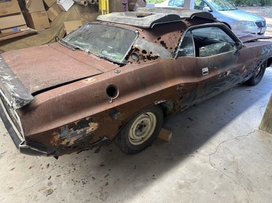 parts-shop-sells-this-dodge-challenger-magazine-car-rain-and-sun-ate-it-alive_60.jpg