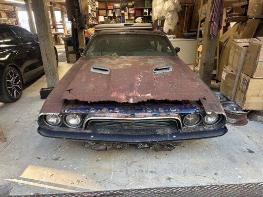 parts-shop-sells-this-dodge-challenger-magazine-car-rain-and-sun-ate-it-alive-246841_1.jpeg