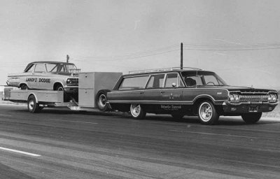 Landy 65 AWB on trailer behind station wagon 01 17 13.jpg