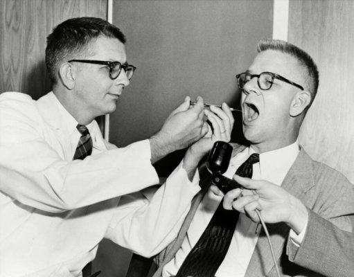 squirting-lsd-into-a-mans-mouth.jpg