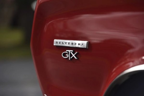 1967-Plymouth-GTX-hardtop-Bright-Red-Mecum-Auctions-F160-fender-badge-front.jpeg