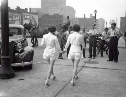 Two Women Show Uncovered Legs in Public 1937.jpg