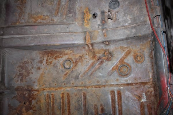 Floorpan clean out 4 - bad repair.JPG