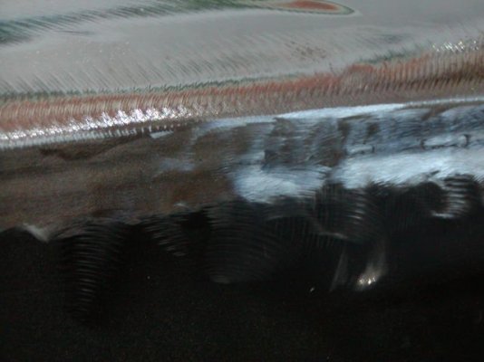 Passenger Quarter Welds After Grinding.JPG