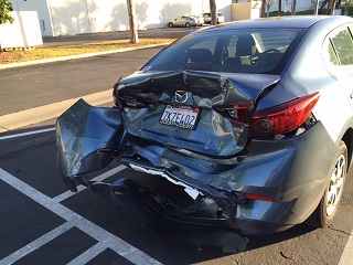 Mazda Down Small.jpg Mazda Down Small.jpg