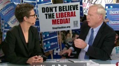 Liberal Media Don't trust them SIGN behind Chris Mathews & Rachel Maddow.jpg