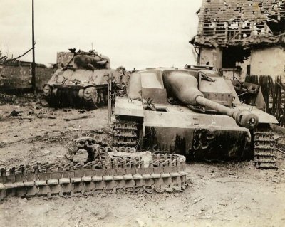 horrors-of-war-knocked-out-american-m-4-tank-and-german-sturmgeschutz-iv-sit-side-by-side-in-the.jpg