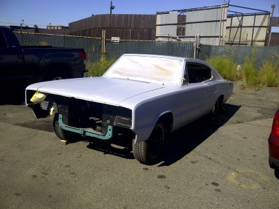 66charger at bodyshop primed.jpg