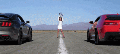 Car Babe Flagging New Mustang & New Camaro @ launch.gif