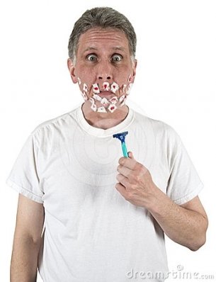 Man-Shaving-Face-Full-Of-Cuts-Funny-Razor-Image.jpg