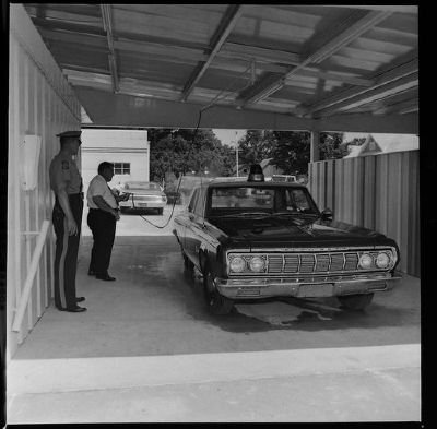 64PlymouthCopCarAtCarWash_zps2a3056d6.jpg