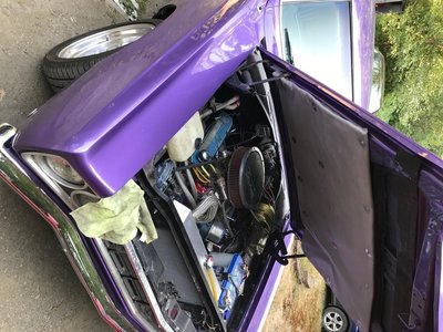 Roadrunner motor in hood up.JPG Roadrunner motor in hood up.JPG