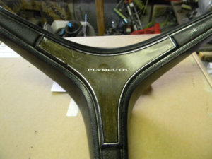 plymouth center button.jpg plymouth center button.jpg