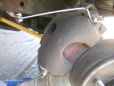 broken pad tab.JPG broken pad tab.JPG