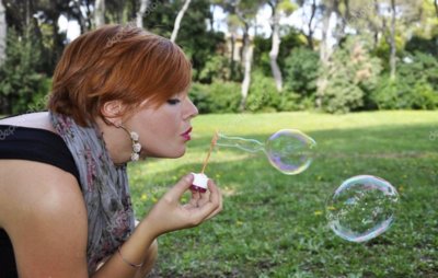depositphotos_28619643-stock-photo-young-girl-blowing-bubbles.jpg