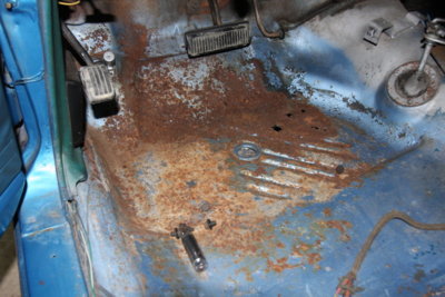Rusting Floorpan.JPG Rusting Floorpan.JPG