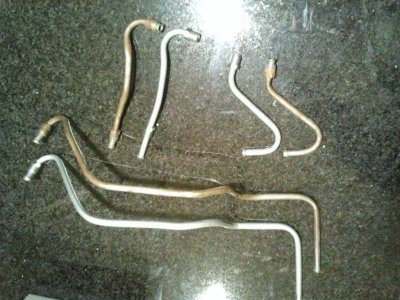 Fuel lines new and old.jpg Fuel lines new and old.jpg