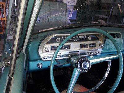 dash, showing st wheel, buttons, & radio speaker grille.jpg