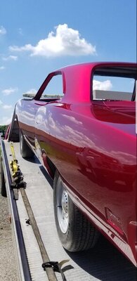 70 rr getting loaded on flat bed.jpg