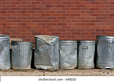line-metal-trash-cans-against-260nw-640010.jpg